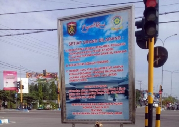Memberi Uang kepada Pengamen atau Pengemis Di Sekitar Lampu Lalu Lintas Bisa Kena Denda 50 Juta Rupiah