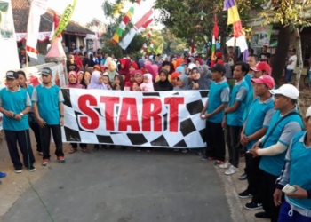 Serentak Seluruh Desa, Tua Muda Ramaikan Jalan Sehat Hari Jadi Ngawi ke 660