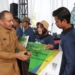 Negara Hadir, Pemkab Ngawi Luncurkan Jaminan Sosial Ketenagakerjaan dan Gelar Pasar Murah